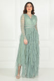 Evening dress with layers of ruffles and embroidered waist in pistachio color