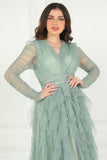 Evening dress with layers of ruffles and embroidered waist in pistachio color