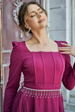 Pleated dress with a belt decorated with crystal tassels, fuchsia color