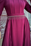 Pleated dress with a belt decorated with crystal tassels, fuchsia color