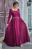 Pleated dress with a belt decorated with crystal tassels, fuchsia color