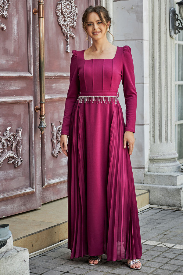 Pleated dress with a belt decorated with crystal tassels, fuchsia color