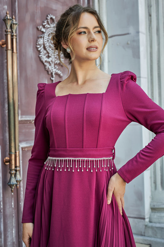 Pleated dress with a belt decorated with crystal tassels, fuchsia color