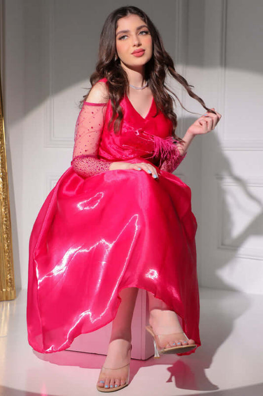 Fluffy evening dress decorated with fuchsia beads