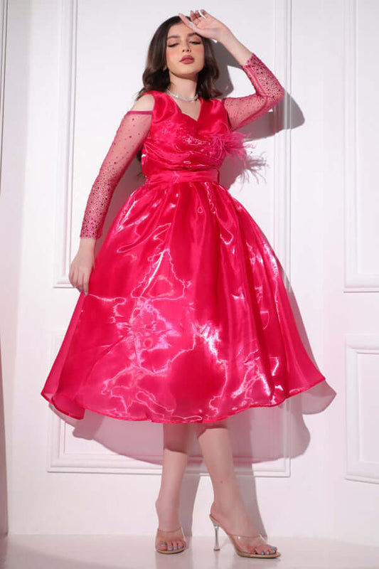 Fluffy evening dress decorated with fuchsia beads