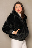 Black winter jacket with hoodie collar and zipper 