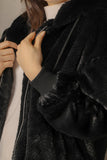 Black winter jacket with hoodie collar and zipper 