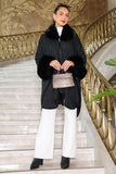 Black knitted shawl with fur sleeves 