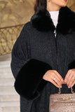 Black knitted shawl with fur sleeves 