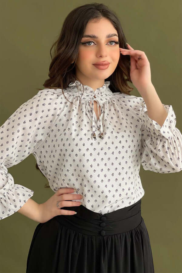 Polka dot blouse with tie