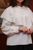 Crepe blouse with embroidered ruffle neck, white