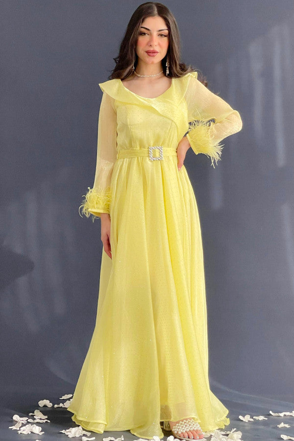 Elegant yellow evening dress decorated with crystals 