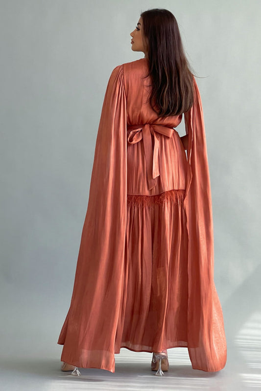 Metallic dress embroidered with crystals with a cape design in orange