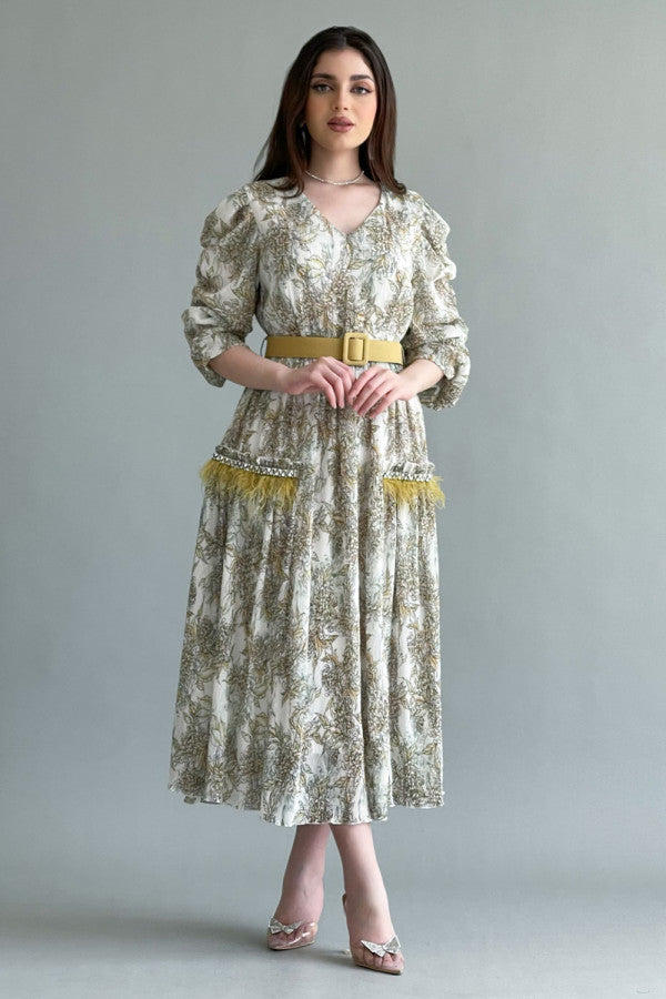 فستان كلوش بطباعة ازهار مزين بكريستال لون اصفر