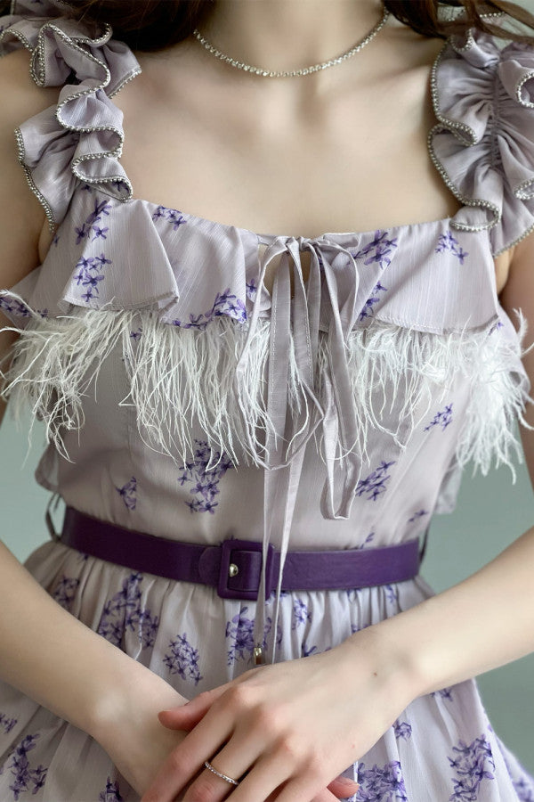 Mauve feather-decorated ruffled dress