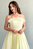 Yellow feather-decorated cloche top dress