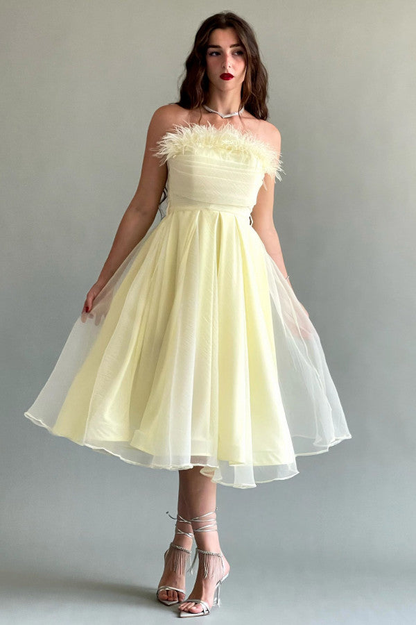 Yellow feather-decorated cloche top dress