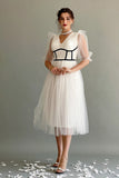 White tulle dress with crochet cut