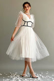 White tulle dress with crochet cut