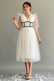 White tulle dress with crochet cut