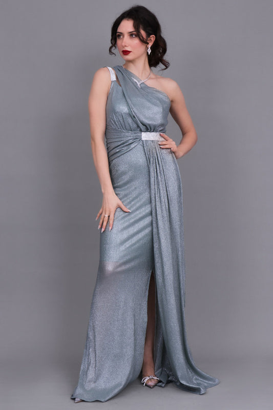 One-shoulder evening dress decorated with a crystal ribbon, pistachio green color