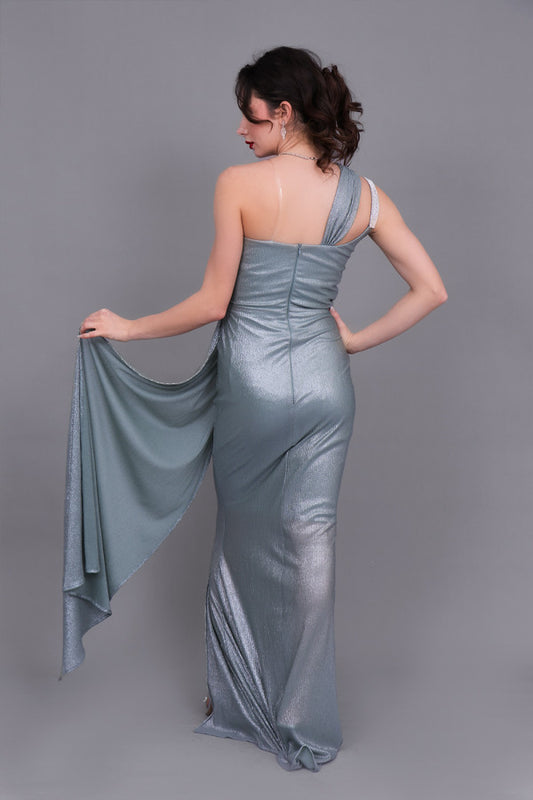 One-shoulder evening dress decorated with a crystal ribbon, pistachio green color