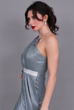 One-shoulder evening dress decorated with a crystal ribbon, pistachio green color