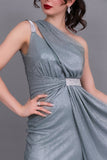 One-shoulder evening dress decorated with a crystal ribbon, pistachio green color