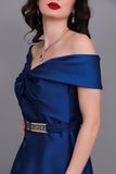 Close-of-shoulder evening dress with bow, turquoise color