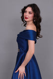 Close-of-shoulder evening dress with bow, turquoise color