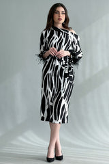 One shoulder dress decorated with feathers, white and black