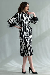 One shoulder dress decorated with feathers, white and black