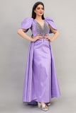 Evening dress with embroidered chest and tail in the back, mauve color