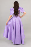 Evening dress with embroidered chest and tail in the back, mauve color