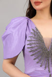 Evening dress with embroidered chest and tail in the back, mauve color