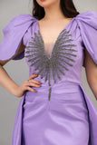 Evening dress with embroidered chest and tail in the back, mauve color