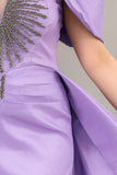 Evening dress with embroidered chest and tail in the back, mauve color