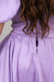 Evening dress with embroidered chest and tail in the back, mauve color