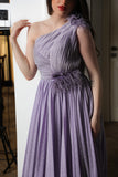 Evening dress with pleated design on the chest and one shoulder, purple