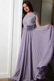 Evening dress with pleated design on the chest and one shoulder, purple