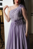 Evening dress with pleated design on the chest and one shoulder, purple