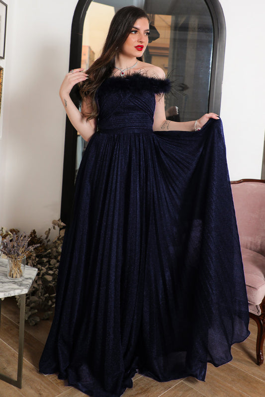 Navy blue evening dress decorated with feathers