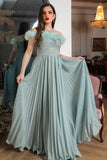 Tiffany color evening dress decorated with feathers