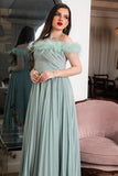 Tiffany color evening dress decorated with feathers