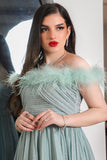 Tiffany color evening dress decorated with feathers