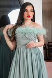 Tiffany color evening dress decorated with feathers