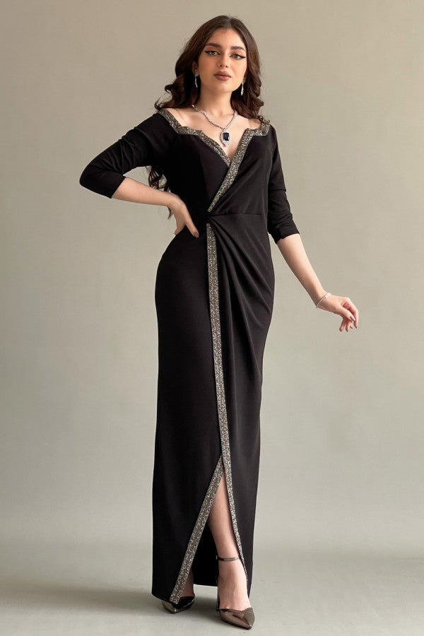 Black jersey wrap dress decorated with a crystal ribbon