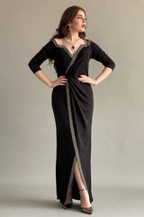 Black jersey wrap dress decorated with a crystal ribbon