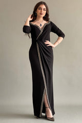 Black jersey wrap dress decorated with a crystal ribbon