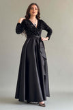 Black sequined v-neck dress